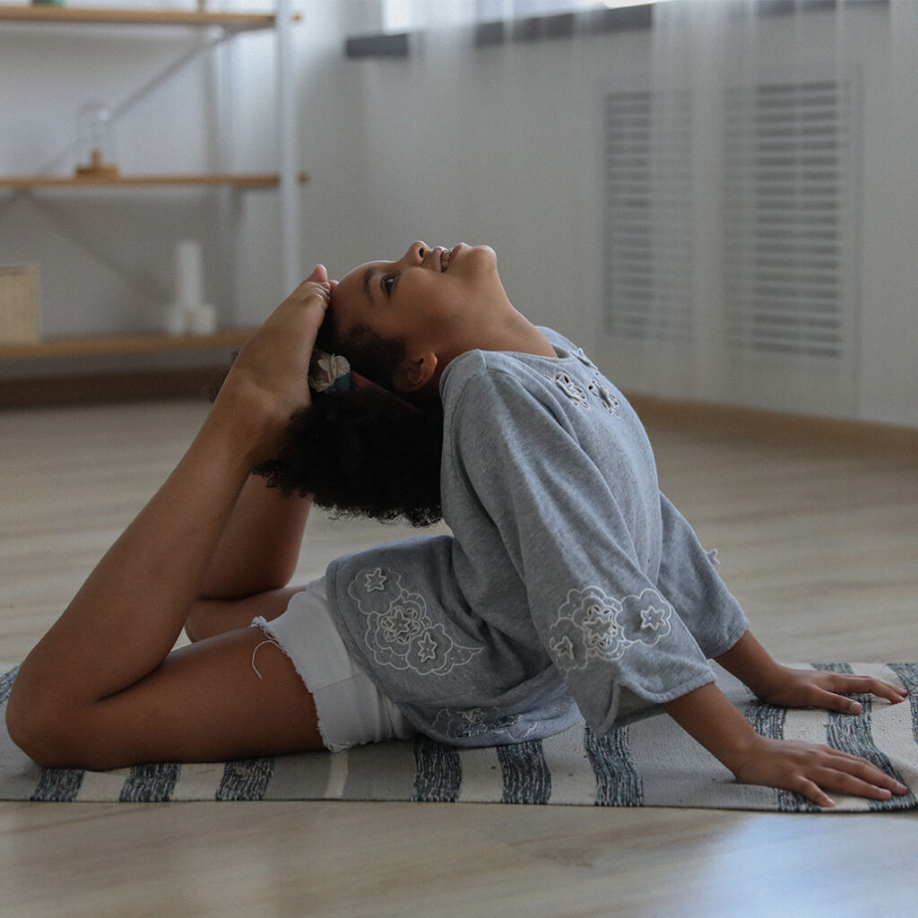 girl doing kids yoga